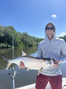 Nice tarpon on light tackle! Great jigging and fly fishing action today.