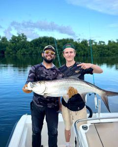 Two anglers fishing for tarpon in PR
