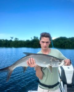 A person fishing for a tarpon in San Juan