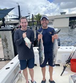 2 people enjoying a fishing trip in Boca Raton