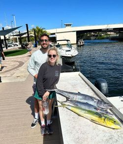 Two people fishing in Florida with 31-inch fish