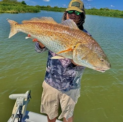 Angler catching a fish in LA