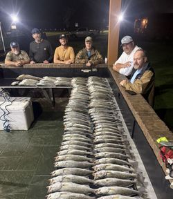 Six people enjoying a fishing trip in Port Sulphur