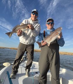 Two people fishing in Port Sulphur