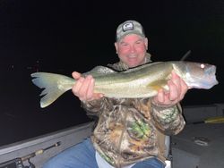 Angler catching a fish in Ottertail