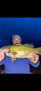 Angler with 23-inch fish in Ottertail