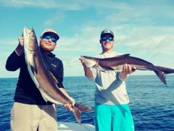 Two fishers in FL catching big fish