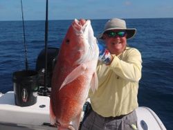 Angler with a big 22-inch freshwater fish in South Daytona