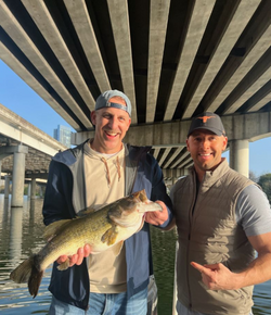 Two people fishing in TX