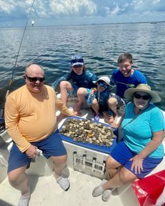 Group of 5 people enjoying fishing tours in FL