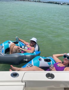 The ladies enjoying a nice float and cold beverage at the sandbar. Call us or book with us today. 