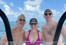 Three people enjoying a fishing tour in FL