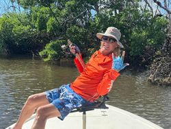 A person enjoying a fishing tour in Cape Coral