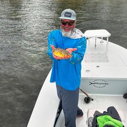 Angler with a 6-inch fish in Islamorada