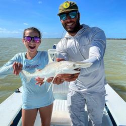 Photograph of an Atlantic Sharpnose Shark, a 19-inch fish, caught while fishing in FL