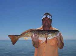 A solo angler fishing at South Padre Island
