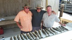 Three people fishing at South Padre Island