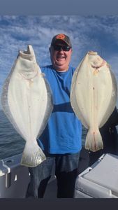 Two large California flounder caught during fishing trip in New York City waters