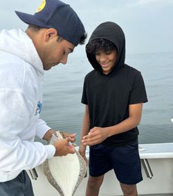 Two people fishing in New York