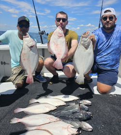 3 people fishing for 5 big fish in New York City