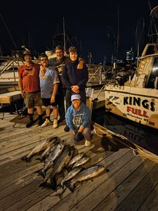 A group of 5 people fishing in Milwaukee