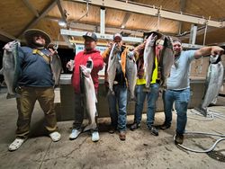 4 people fishing in Wisconsin, catching 6 fish