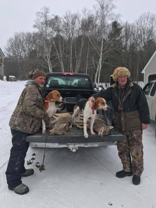 Four people enjoying a fishing and hunting adventure in ME
