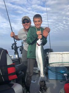 A pair of anglers with a big 24-inch catch in Sheboygan