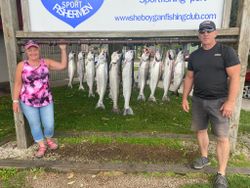Chinook and Coho salmon caught by two anglers in Sheboygan