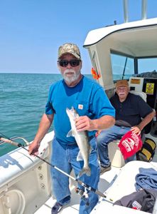 Two people fishing in Port Clinton