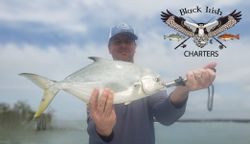 Angler with a 24-inch permit fish in Bonita Springs