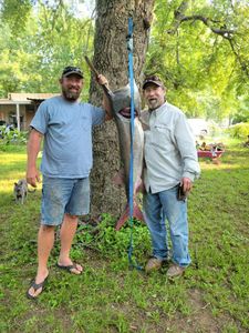 Two people fishing with a single, 36-inch fish in OK
