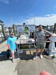 Two people fishing in Biloxi