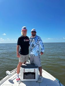 Two people fishing in MS