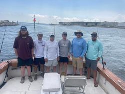 6 people enjoying a fishing trip in Gulfport
