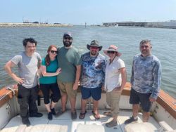 Group of 6 people fishing in Gulfport