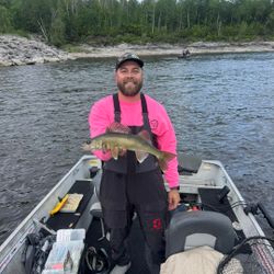 Fisherman with a walleye in WI