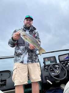 Angler with a 17-inch fish caught while fishing in Wisconsin
