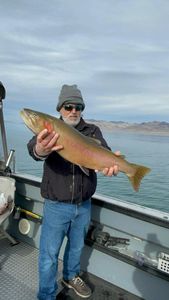 A person fishing for a big catch in CA
