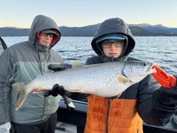Two people fishing for a lake trout in Reno