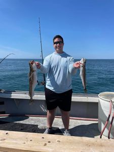 Man proudly displaying his catch!