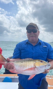 A fisherman with one 18-inch catch in San Juan