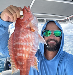 Fisherman with 1 medium-sized fish in PR