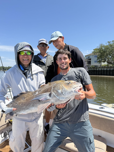 Nice black drum using deep sea jigging and trolling techniques in partly cloudy conditions!