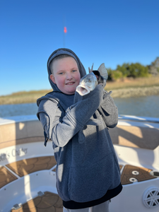 Enjoying a peaceful day on the water with a catch of the day.