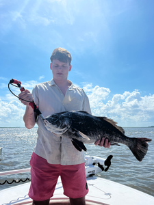 Battling the waves with a mix of deep sea jigging, trolling, and light tackle at 94, Fuskie Lane on a partly cloudy day!