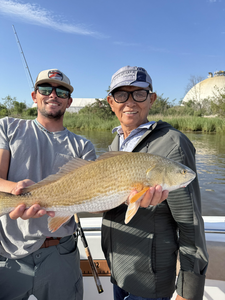 Nice redfish using deep sea jigging and trolling techniques in partly cloudy conditions.