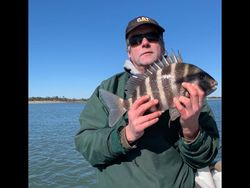 A man fishing for a sheepshead fish in Savannah