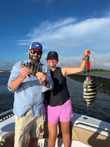 Nice pair of sheepshead using deep sea jigging and light tackle in Savannah!
