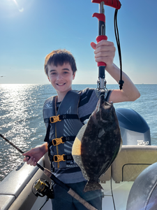 Nice Southern Flounder using deep sea jigging and light tackle techniques!